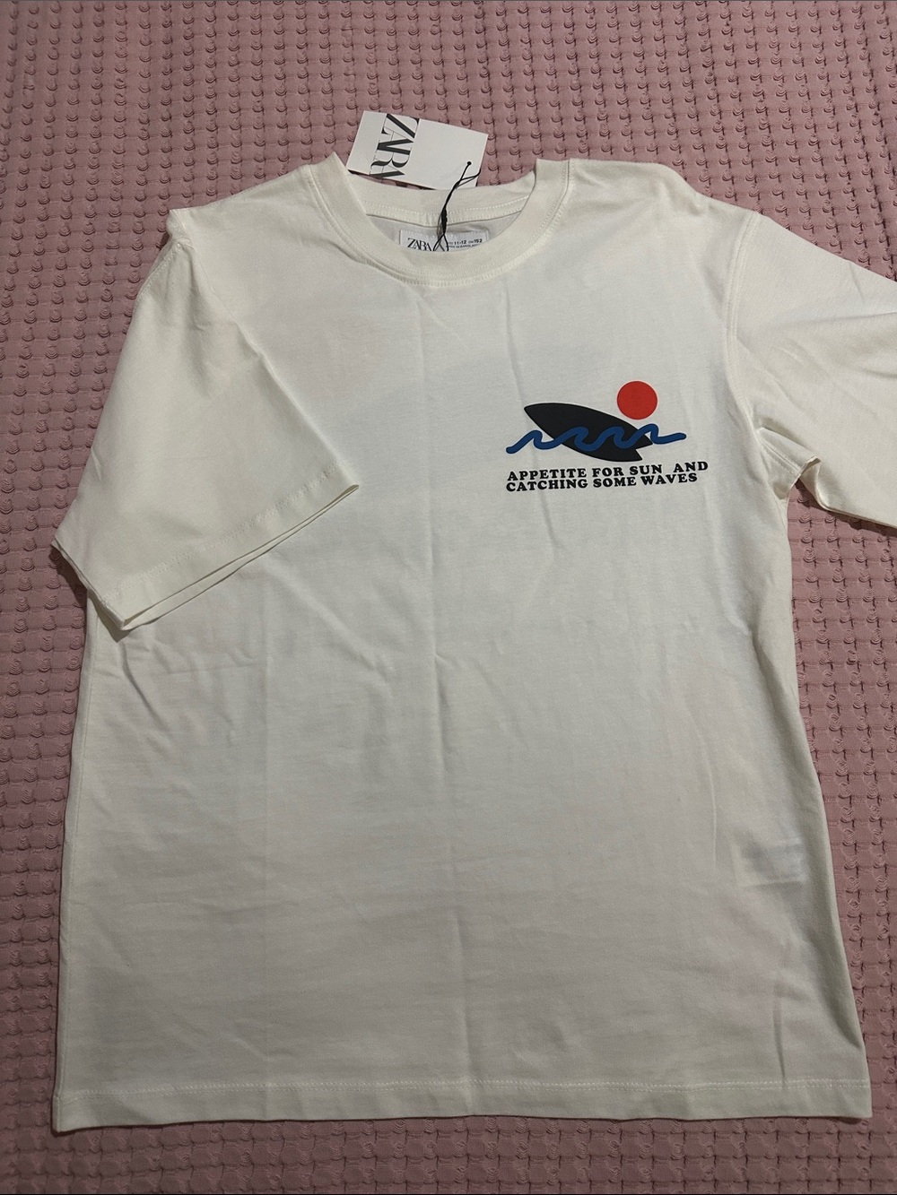 Zara Cream Tee with Navy Wave and Red Sun Graphic